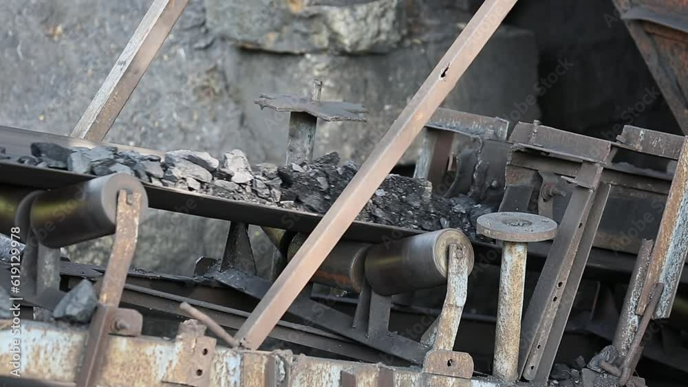 A video of roller belt conveyor machine transporting charcoal or bituminous coal A video of roller belt conveyor machine transporting charcoal or bituminous coal