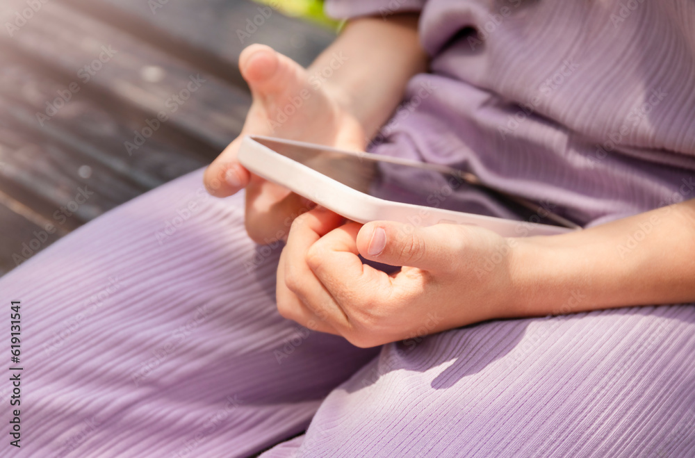 Child hands with mobile smart phone