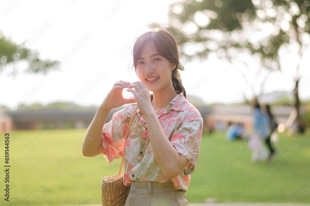 Portrait beautiful young asian woman on summer holiday vacation trip in Thailand. Young hipster female tourist sightseeing summer urban Bangkok destination. Asia summer tourism concept. Portrait beautiful young asian woman on summer holiday vacation trip in Thailand. Young hipster female tourist sightseeing summer urban Bangkok destination. Asia summer tourism concept.