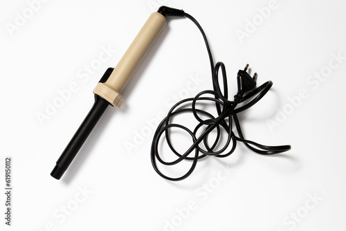 Curling iron on a white background