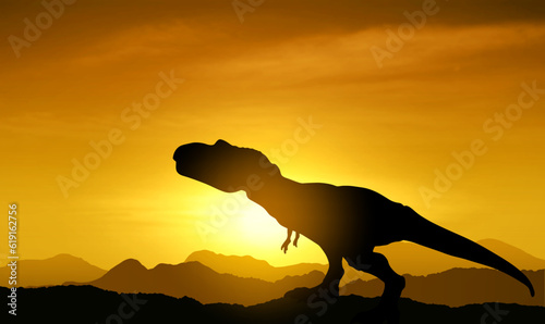 Silhouette of a dinosaur against the sunset. EPS10 vector