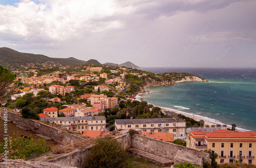 View from Forte Falcone over City of Portoferraio to Padulella beach and Capo D' Enfola
