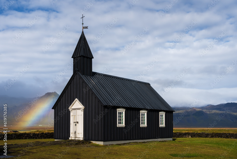 Rainbow at Budir black church in Snaefellsnes peninsula, Iceland