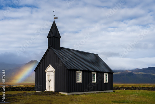 Rainbow at Budir black church in Snaefellsnes peninsula, Iceland