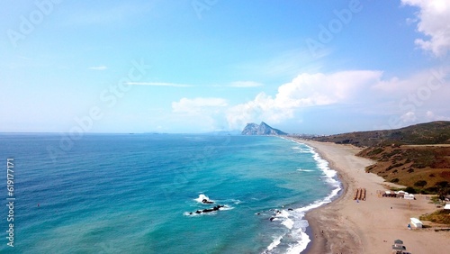 aerial view along the beach near La Alcaidesa with a view towards the Rock of Gibraltar and Africa at the horizon  Playa de la Hacienda  Mediterranean Sea  Andalusia  Malaga  Spain