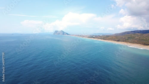 aerial view from the Mediterranean Sea towards the Rock of Gibraltar and Africa at the horizon, Playa de la Hacienda, La Línea de la Concepción, Algeciras, Andalusia, Malaga, Spain