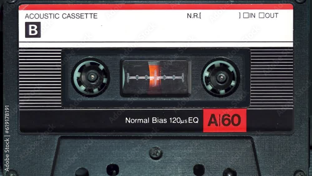 audio cassette plays in tape deck