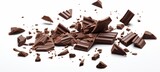 Food photography - Closeup of pieces fragment of dark brown chocolate falling, isolated on white background (Generative Ai)