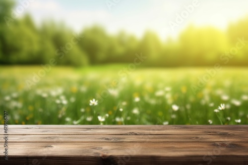 Beautiful spring green meadow background with empty wooden table for product display Generative AI © dhiyaeddine
