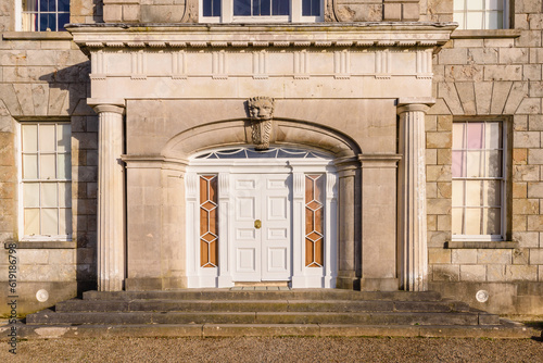 Main entrance door of an old stately home.