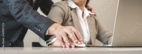 Foto Unhappy, hand of asian young woman employee, man employer or colleague or boss touching her hand and embrace, feeling disgusted, uncomfortable