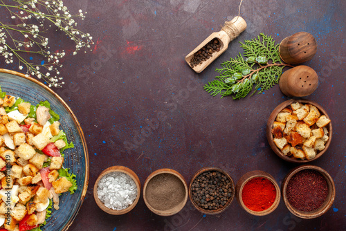 top view tasty caesar salad with different seasonings on dark background salad food meal lunch vegetable