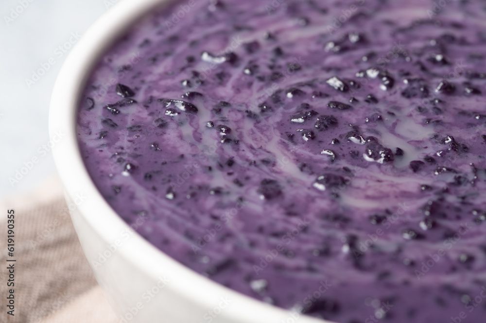 Ube Champorado or tsampurado (topped milk ) is a twist to the famous sweet chocolate rice porridge in Philippine cuisine Ube Champorado or tsampurado (topped milk ) is a twist to the famous sweet chocolate rice porridge in Philippine cuisine