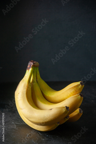 front view fresh yellow bananas on dark background exotic fruit ripe food photo darkness tropical taste