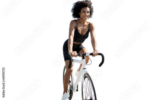 A cyclist in a cycling suit is a curly-haired millennial woman riding a rest, training bike. Transparent background, isolate.
