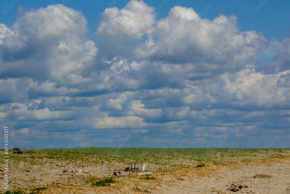Landscape of Kihnu Island. Part of the Estonian island with a cloudy sky