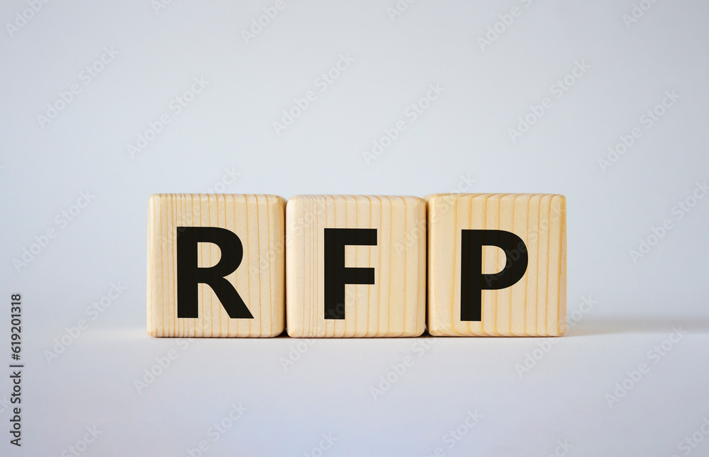 RFP - Request for Proposal. Wooden cubes with word RFP. Beautiful white background. Business and Request for Proposal concept. Copy space. RFP - Request for Proposal. Wooden cubes with word RFP. Beautiful white background. Business and Request for Proposal concept. Copy space.
