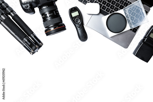 Flat lay composition with equipment for journalist, laptop, flash, camera, lens, tripod, trigger, isolated on transparent background. copy space © Sven Taubert
