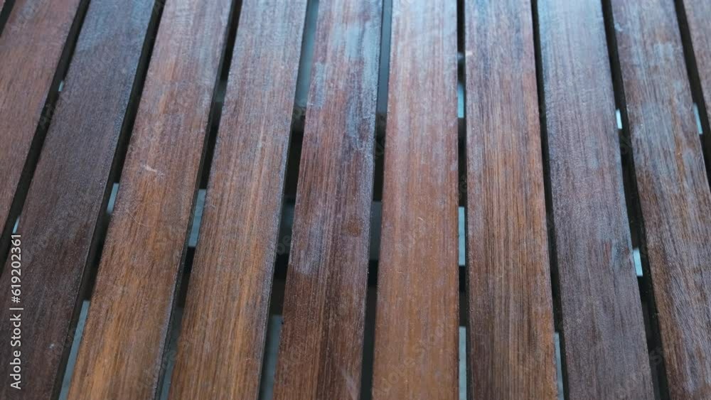 close-up of a striped wooden table close-up of a striped wooden table