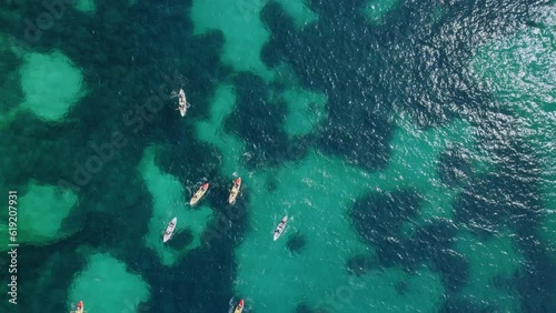 kayaking people in the open sea view from above