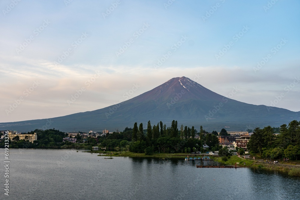 Mt. Fuji towering over a small Japanese town