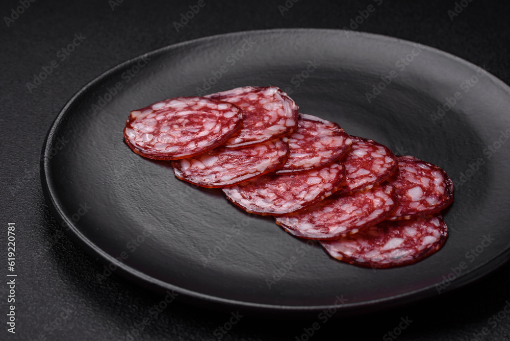 Delicious smoked sausage with bacon, salt, spices and herbs Delicious smoked sausage with bacon, salt, spices and herbs