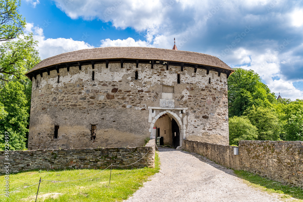 Mighty barbican at Pernstejn whose 3 m thick walls with crenels for light firearms and a machicolation protected a narrow way to the entrance 