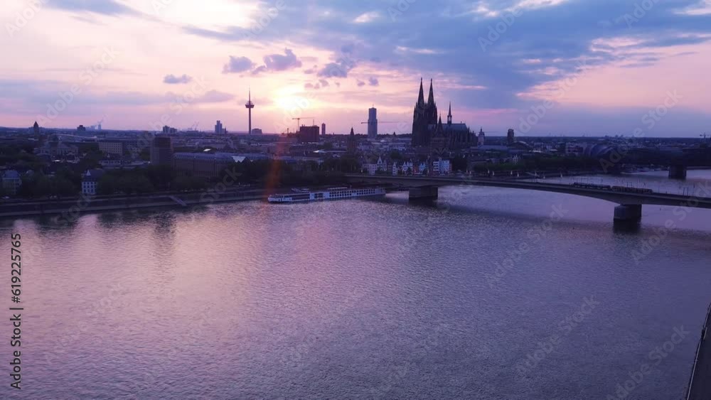 Cologne/Köln Cathedral and Sunset with Rhine river Cologne/Köln Cathedral and Sunset with Rhine river