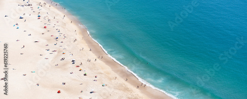 View from above from a cliff on the coast of the Atlantic Ocean near the city of Nazare in Portugal