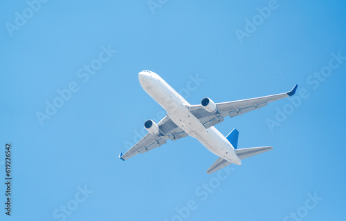 White passenger plane taking off