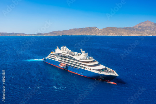 A drone view of a chuise ship in the middle of the sea. Vacation and holidays. Summer time for sea travel. The sea bay. Photo for background and wallpaper. Mediterranean Sea.