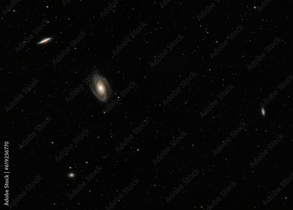 The interacting duo M81 (Bode's Galaxy) and M82 (Cigar Galaxy) sit roughly 12 million light years away in the constellation Ursa Major. The interacting duo M81 (Bode's Galaxy) and M82 (Cigar Galaxy) sit roughly 12 million light years away in the constellation Ursa Major.
