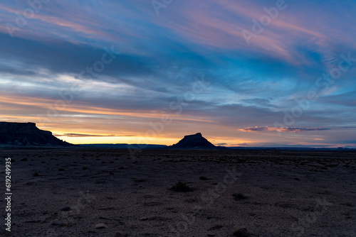 Factory Butte in the Utah desert at sunset