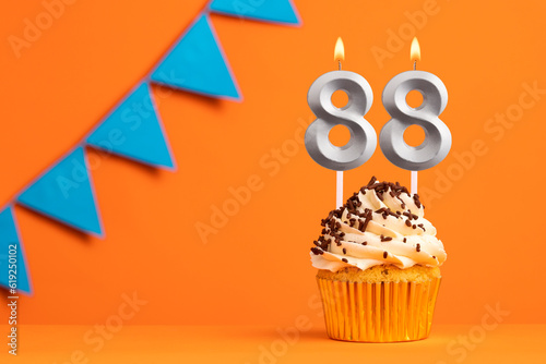 Candle number 88 - Cake birthday in orange background