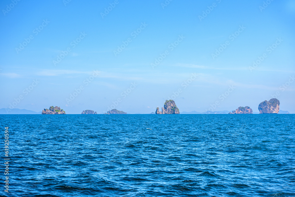 Topical islands in open sea on a sunny day, Ao Nang, Mueang Krabi District, Krabi, Andaman Sea, Thailand
