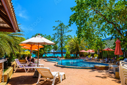 Bungalows houses  coconut palms and swimming pool on Ko Phi Phi Don Island on a sunny day  Ao Nang  Mueang Krabi District  Krabi  Andaman Sea  Thailand