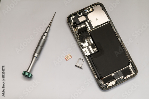 Close-up photos showing process of mobile phone repair