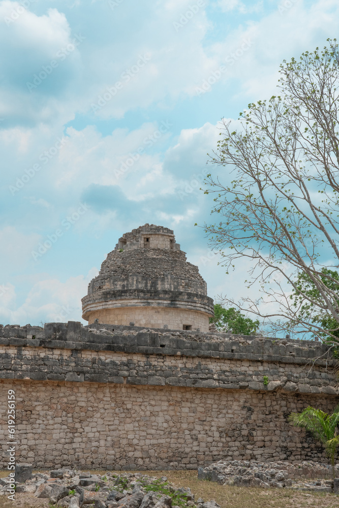The observatory at the archaeological ruins of Chichen Itza in the Yucatan peninsula of Mexico The observatory at the archaeological ruins of Chichen Itza in the Yucatan peninsula of Mexico