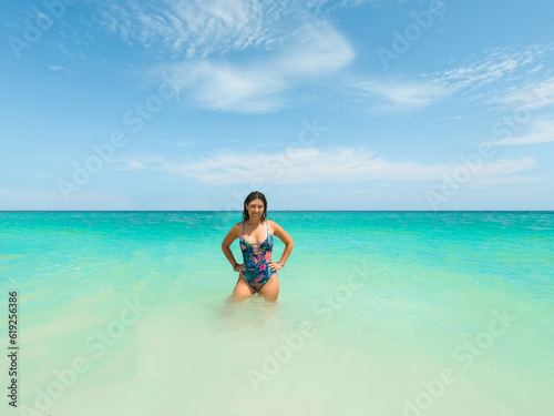 Beautiful woman enjoying the wonderful beaches of Holbox