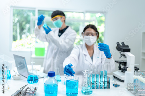 Chemical laboratory research with scientific tube and flask glassware equipment, science medicine liquid experiment test on Chemistry, Biotechnology, or Biology for business medicals development