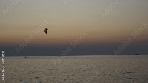 kite on the beach with a view of the sunset sky in Bali