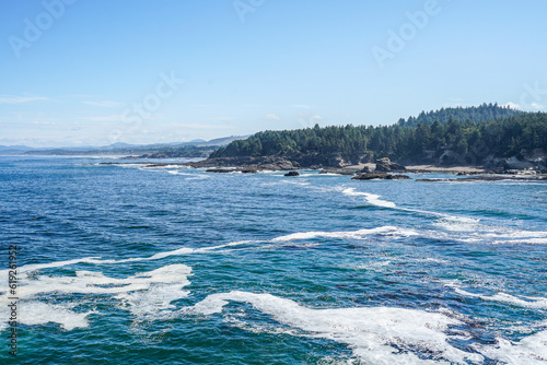 Beautiful Oregon coast. Pacific ocean, beach, cliffs, sky, water.