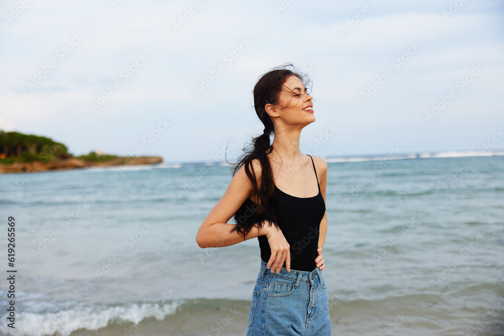 woman vacation sea sand lifestyle smile sunset summer ocean walking beach