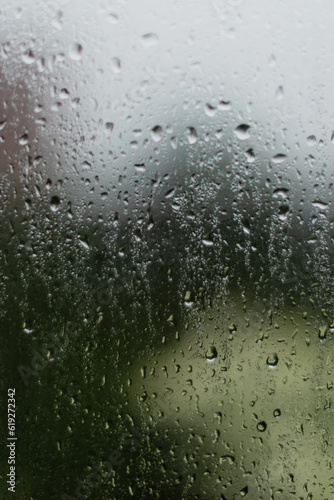 Rain drops on a window glass overlay texture 