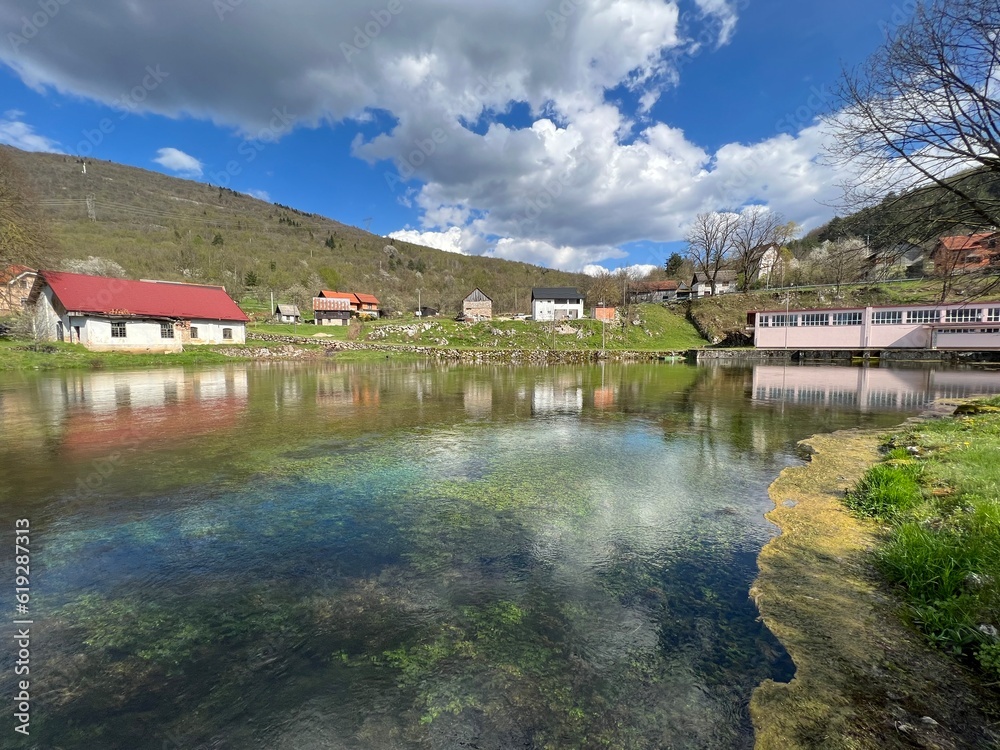 Fototapeta premium The springs of the Gacka river - Tonkovic spring, Croatia (Izvori rijeke Gacke ili Vrila Gacke - Tonkovićevo vrilo ili Tonković vrilo, Sinac - Lika, Hrvatska)