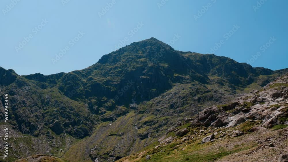 A long shot of the top of Snowdon Mountain on a sunny day in summer. A long shot of the top of Snowdon Mountain on a sunny day in summer.