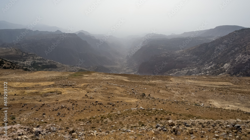 Beautiful sunset landscape at King`s Highway in Jordan somewhere between Petra archeological site and the Dead Sea. The King’s Highway was an ancient trade route connecting Africa with Mesopotamia
