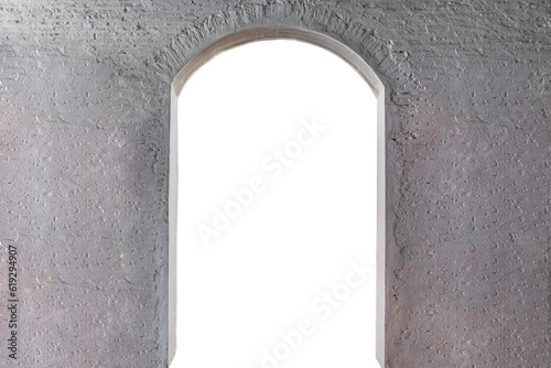 Open semicircular door in white brick wall