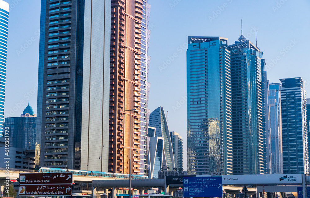 Obraz premium Dubai, UAE - 21.06.2023 - Shot of the modern skyscrapers along Sheikh Zayed road