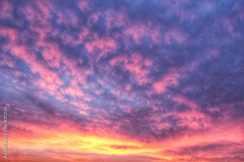 Panoramic sunrise or sunset sky. Colorful clouds. Nature background